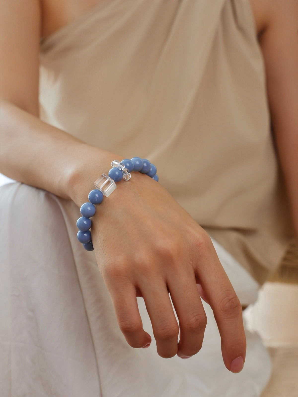 Baby Blue Australian Opal, White Phantom and Clear Quartz bracelet worn on wrist