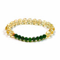 Side view of high-grade Citrine bracelet with emerald-green Diopside
