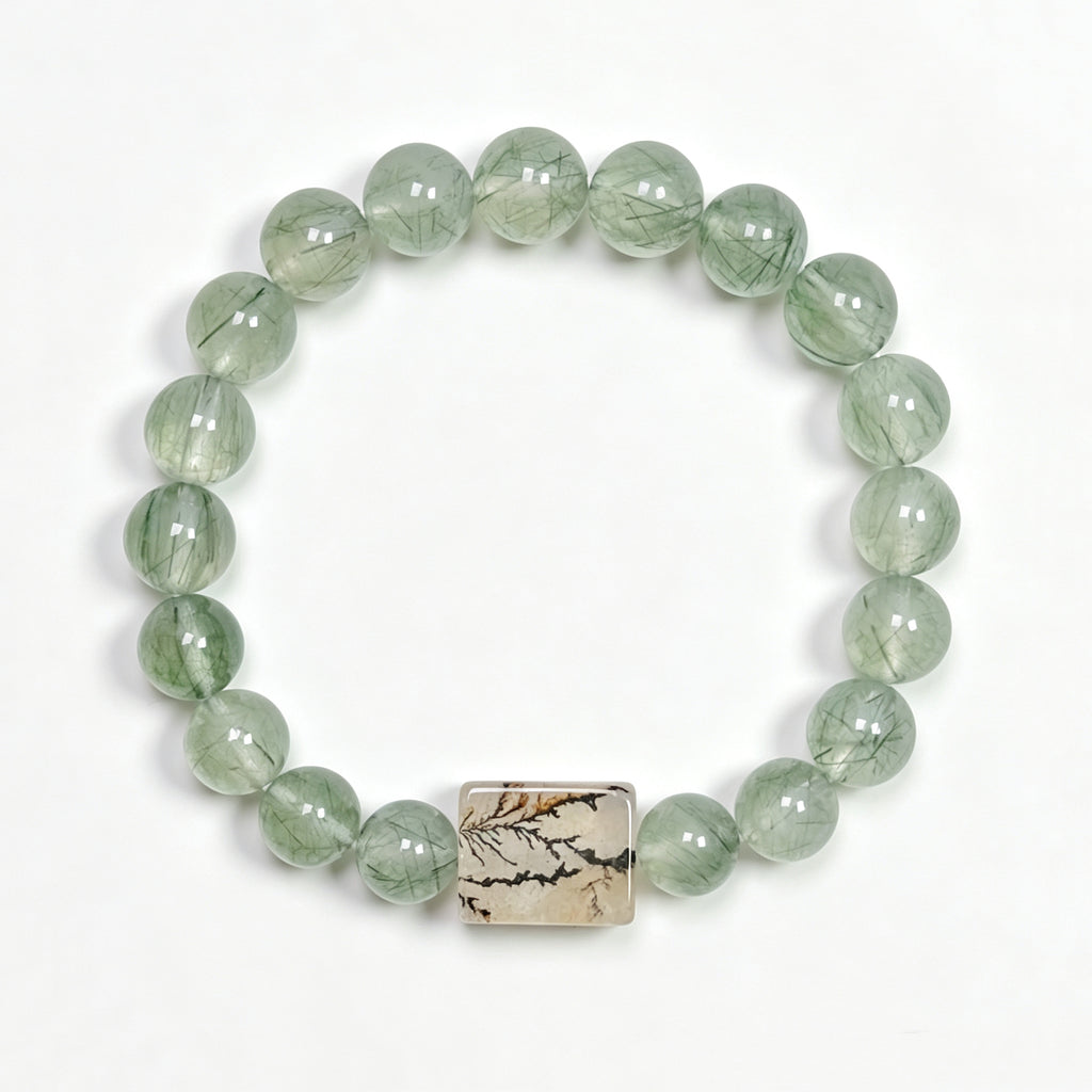 Top view of Green Rutilated Quartz crystal bracelet showing full bead arrangement for abundance and aligned action