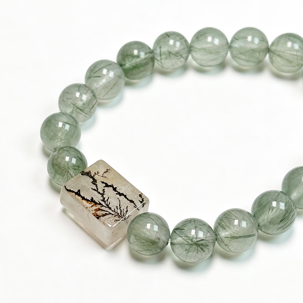 Close-up detail of Green Rutilated Quartz crystal bracelet showing natural stone texture for confidence and abundance
