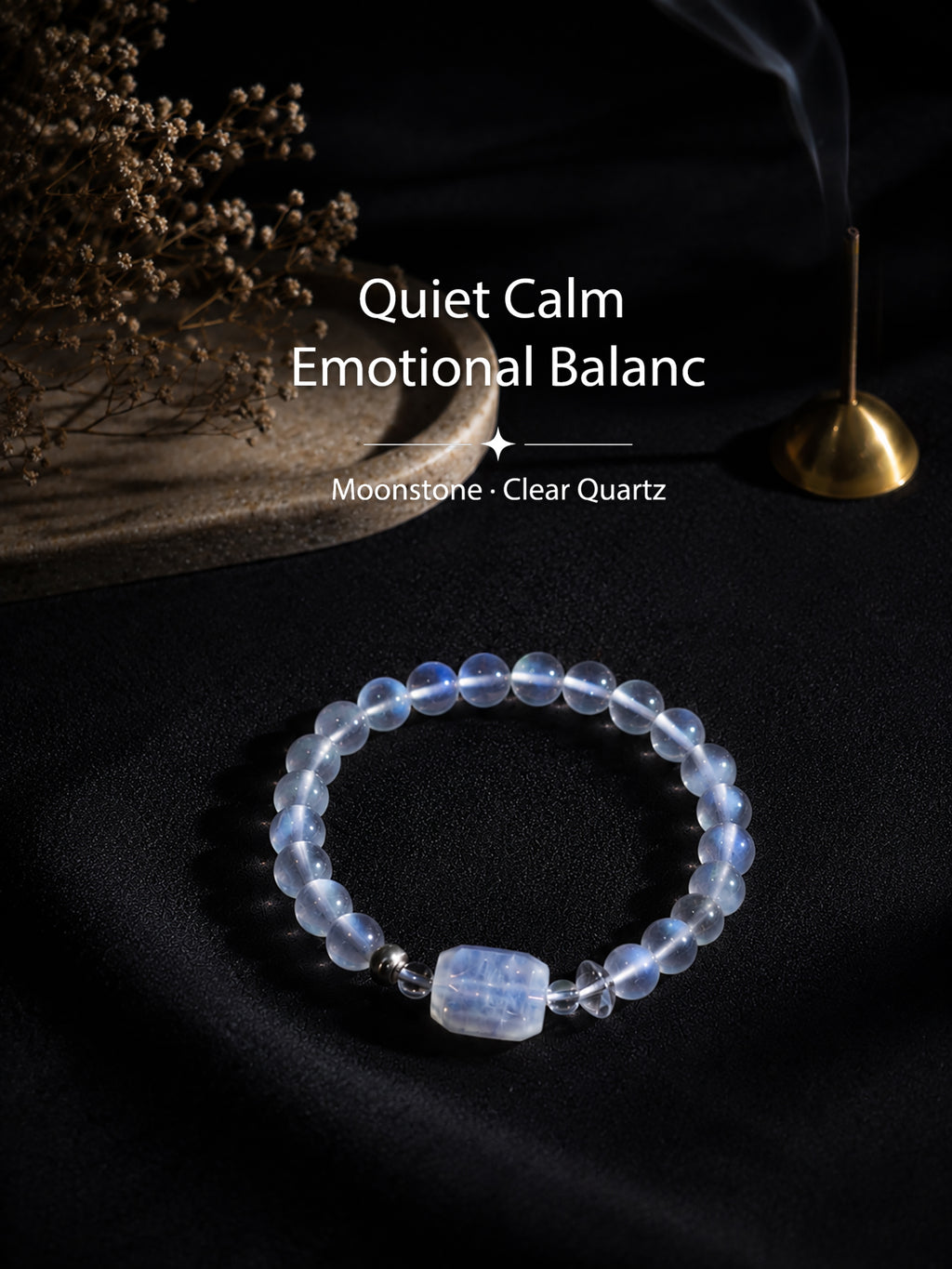 Moonstone bracelet styled on meditation altar with calming spiritual objects
