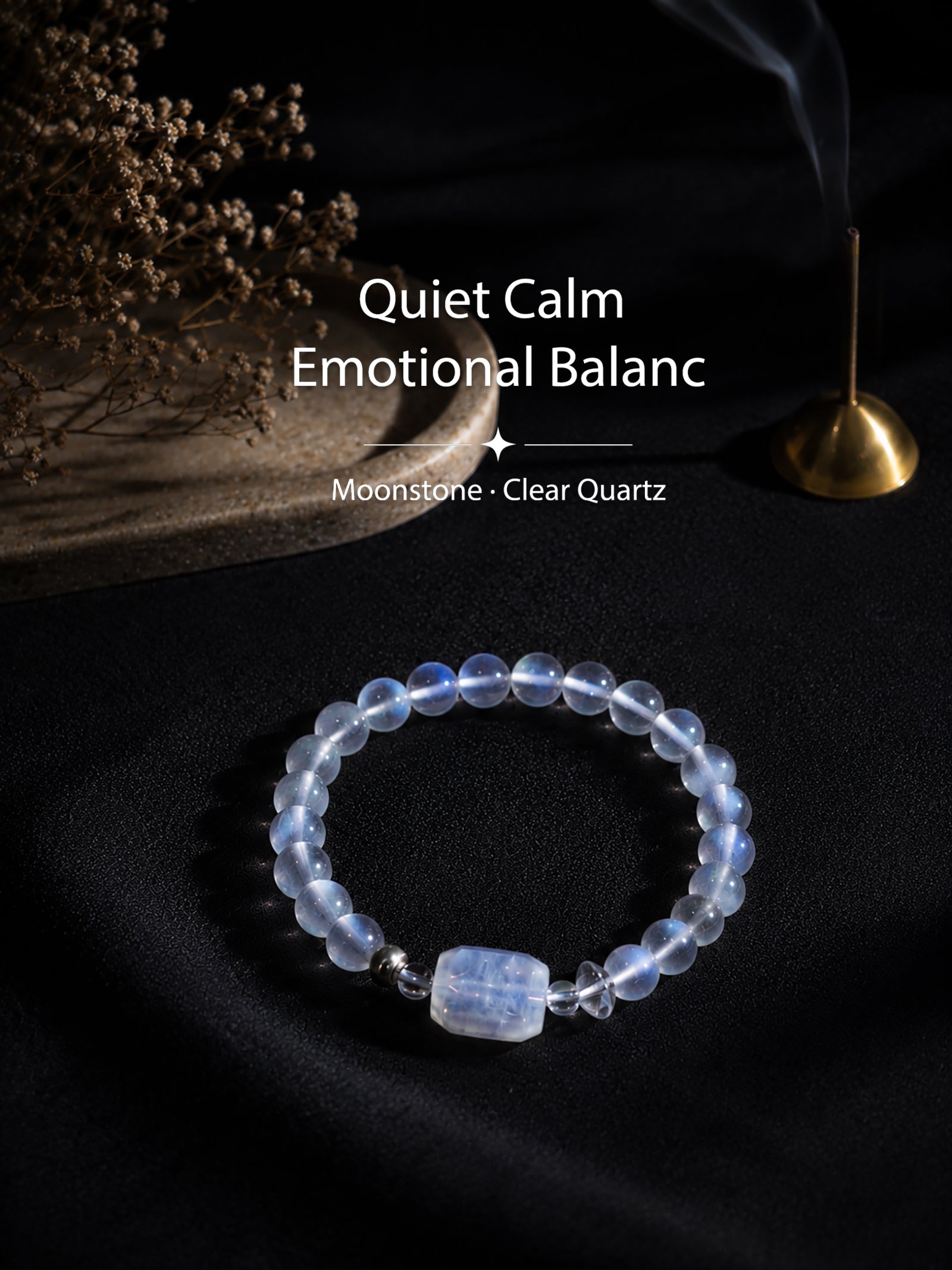 Moonstone bracelet styled on meditation altar with calming spiritual objects
