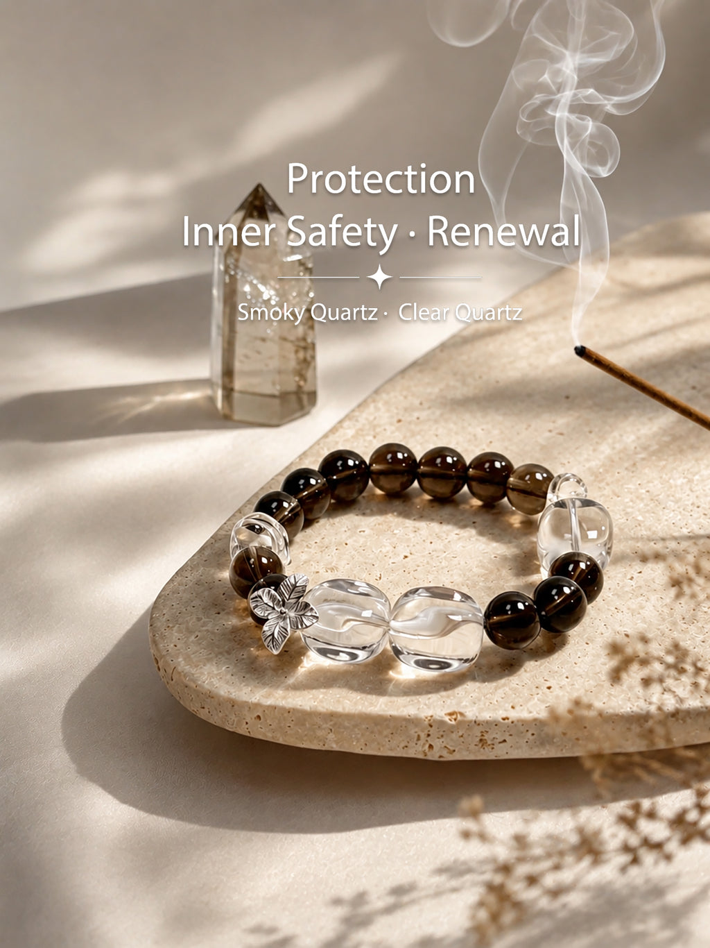 Smoky Quartz and Clear Quartz bracelet styled on meditation altar for protection, stability, and and renewal energy