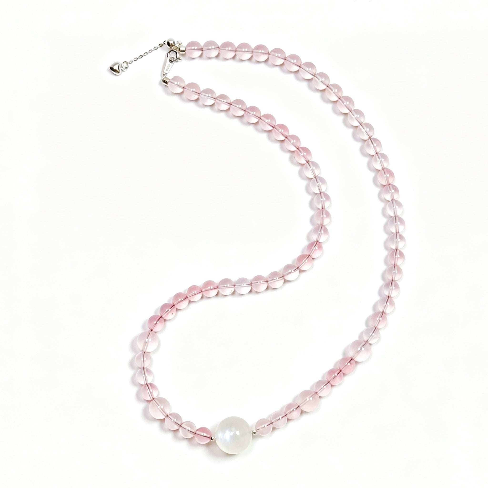 Top view of rose quartz crystal necklace showing full bead arrangement for love and emotional connection
