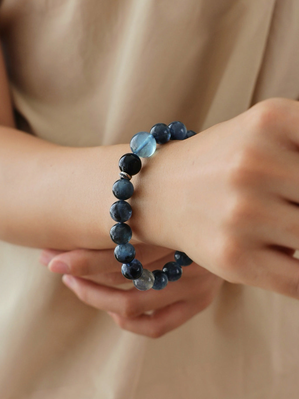 Aquamarine with Biotite, Black Tourmaline and Labradorite bracelet worn on wrist