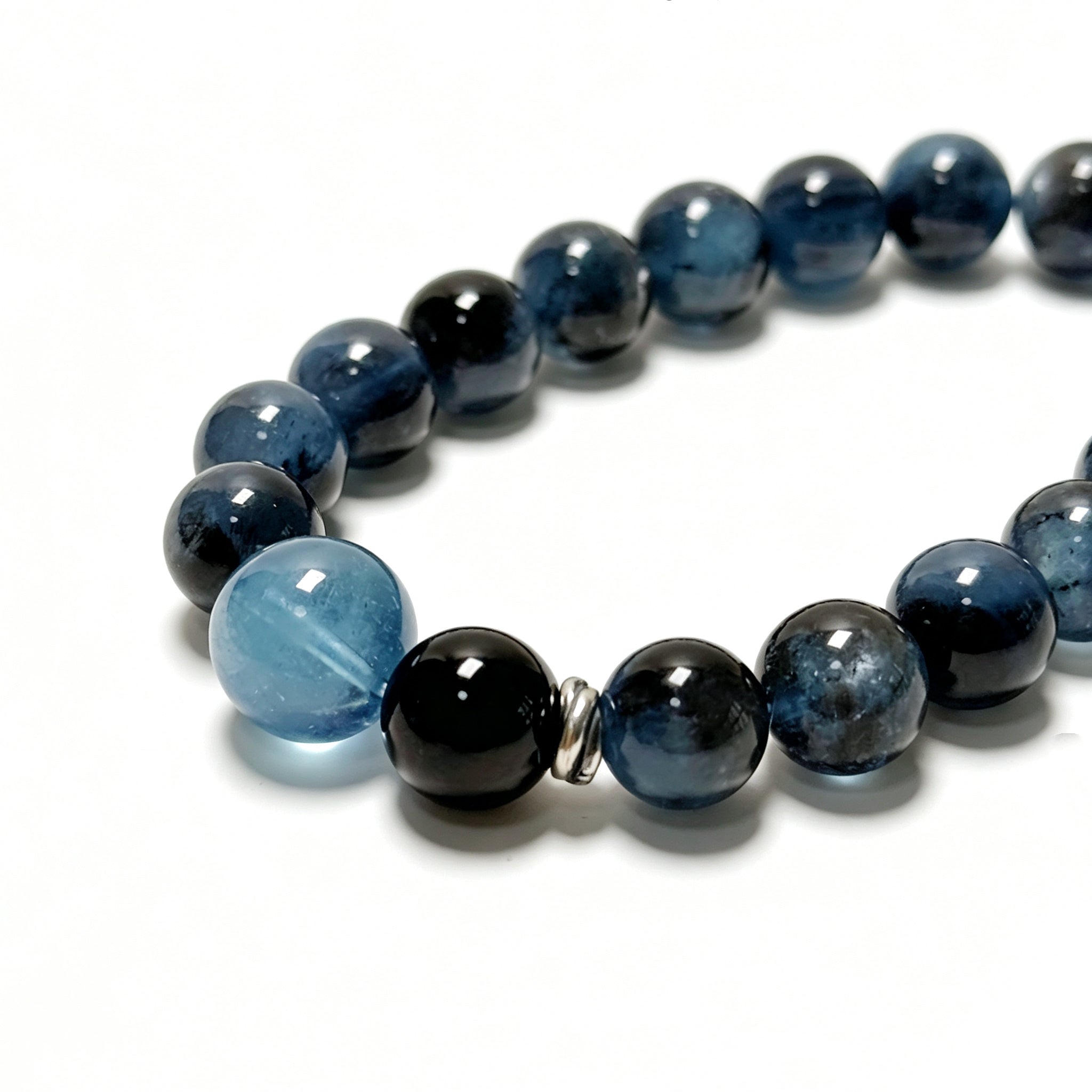 Close-up detail of Aquamarine with Biotite bracelet showing natural crystal texture