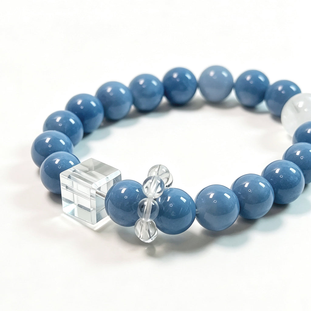 Close-up detail of natural Baby Blue Australian Opal, White Phantom Quartz and Clear Quartz bracelet