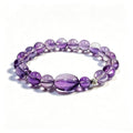 Amethyst bracelet on clean white background for intuition and inner clarity