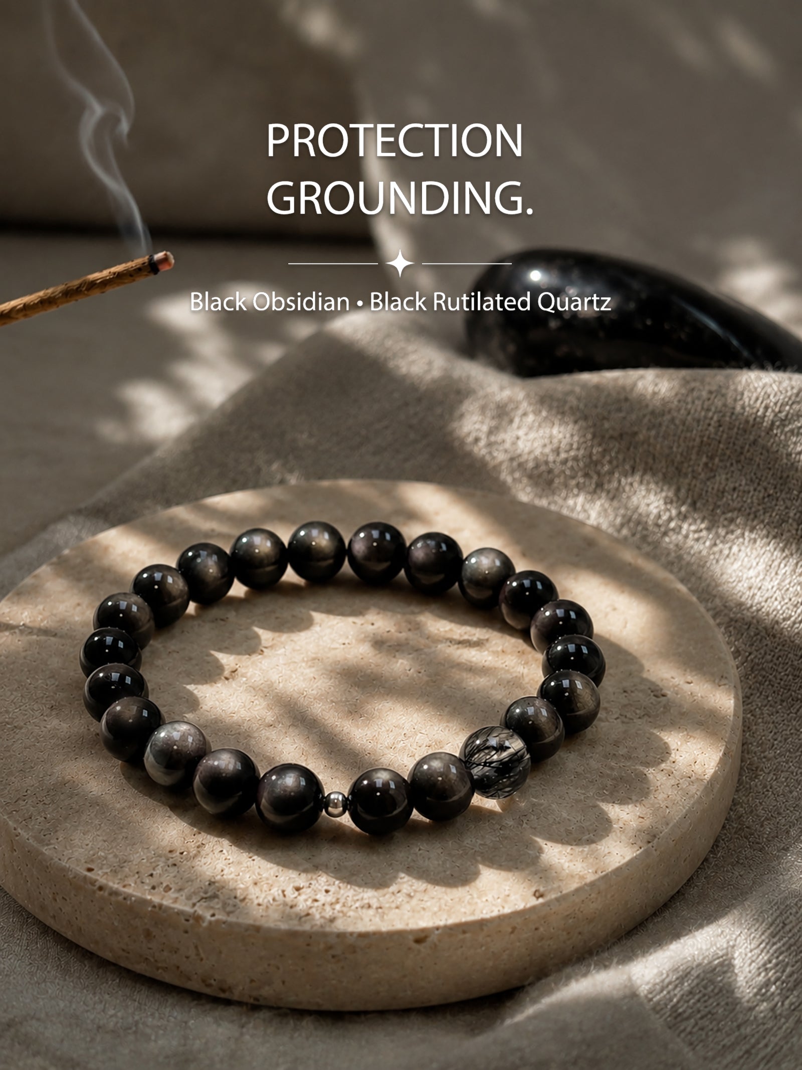 Black obsidian and black rutilated quartz bracelet styled in a calm grounding setting