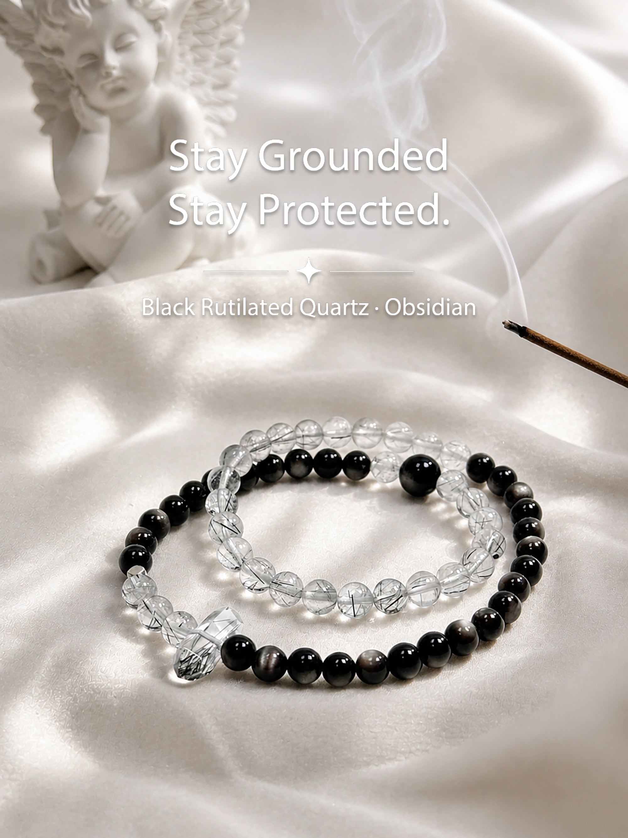 Black rutilated quartz and obsidian bracelet styled on meditation altar for protection, stability, and grounded energy