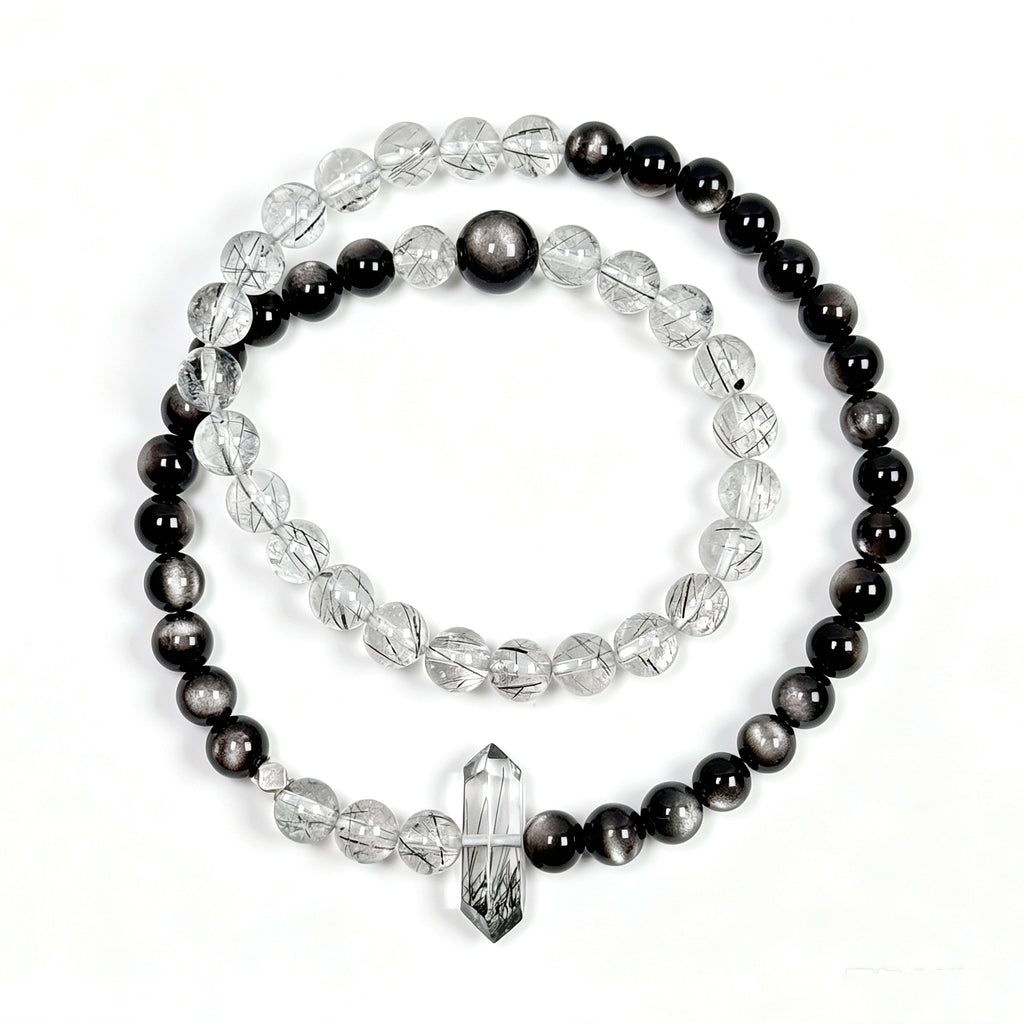Top view of Black rutilated quartz and obsidian crystal bracelet showing full bead arrangement for protection and grounding
