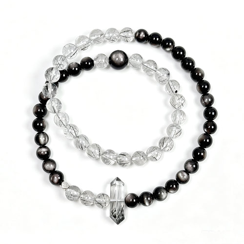 Top view of Black rutilated quartz and obsidian crystal bracelet showing full bead arrangement for protection and grounding