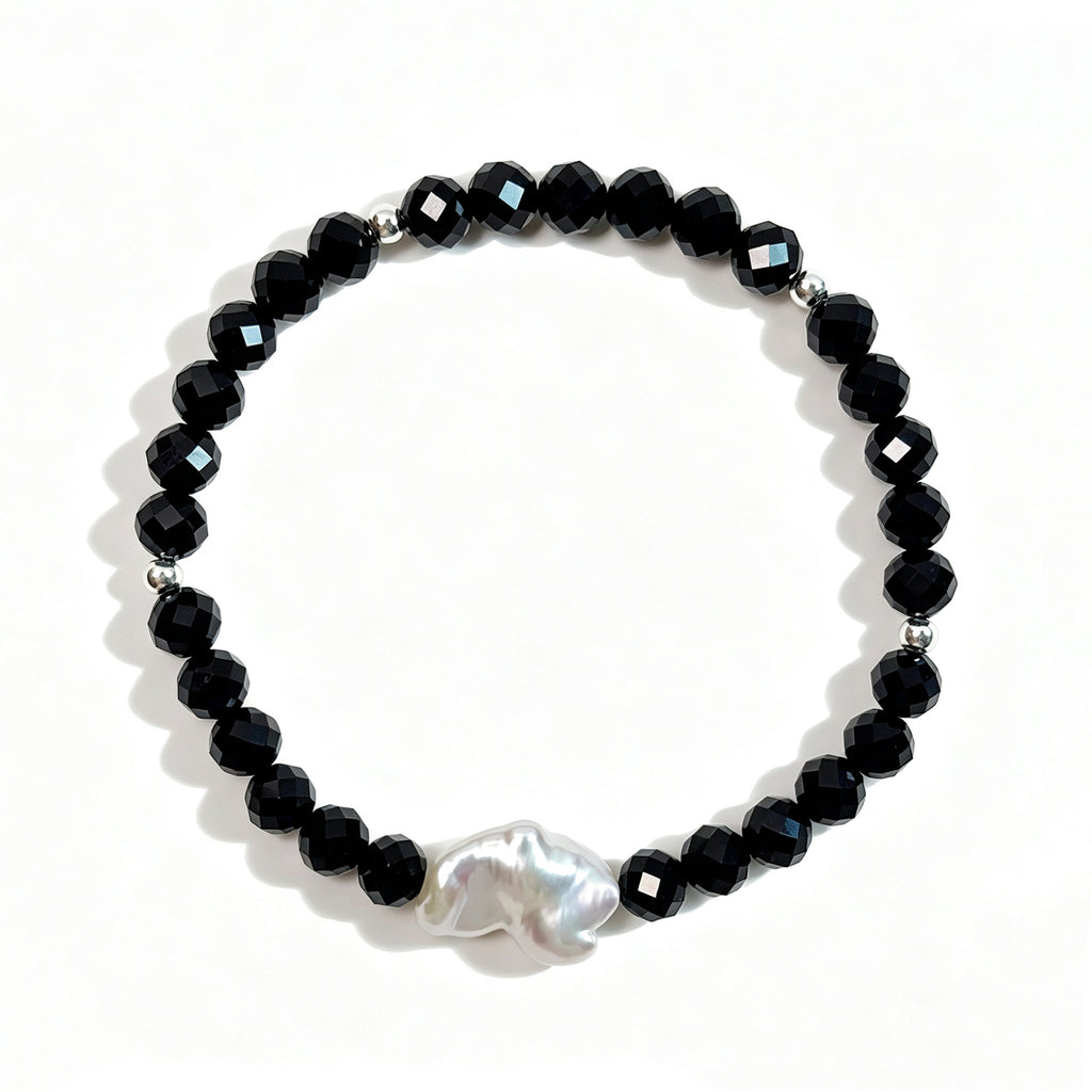 Black spinel and natural baroque pearl bracelet with 925 sterling silver beads, top view