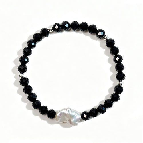 Black spinel and natural baroque pearl bracelet with 925 sterling silver beads, top view