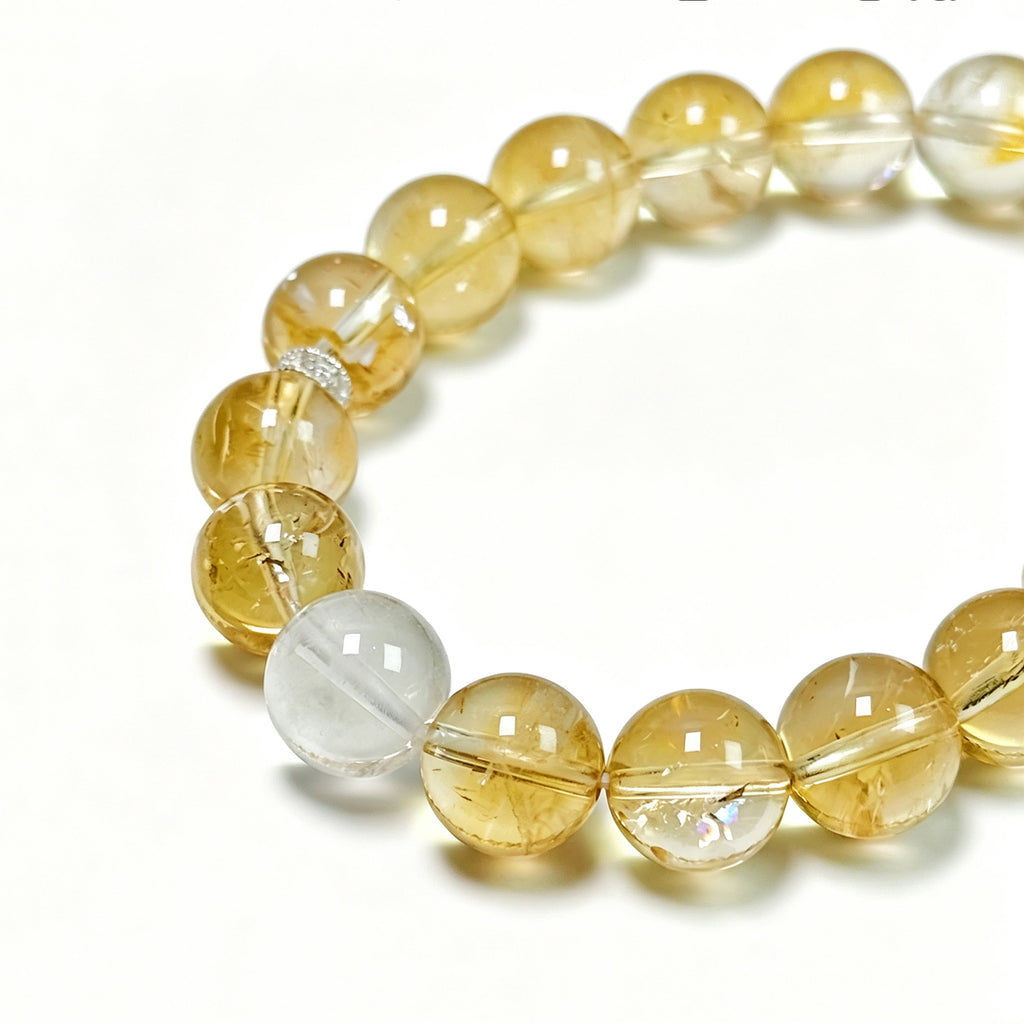 Close-up detail ofHigh-rainbow Citrine abundance crystal bracelet showing natural stone texture