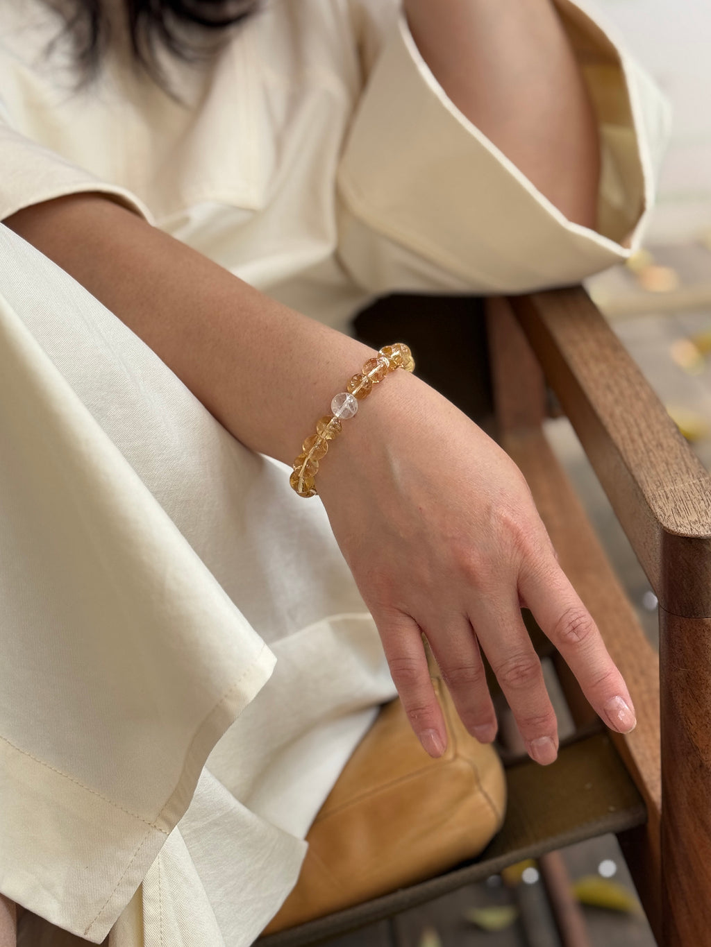 High-rainbow Citrine abundance crystal bracelet worn in a relaxed lifestyle setting for calm and balanced energy