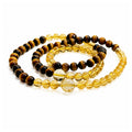 Citrine and Tiger’s Eye triple wrap bracelet on clean white background
