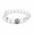 Clear quartz bracelet on clean white background for renewal and emotional balance