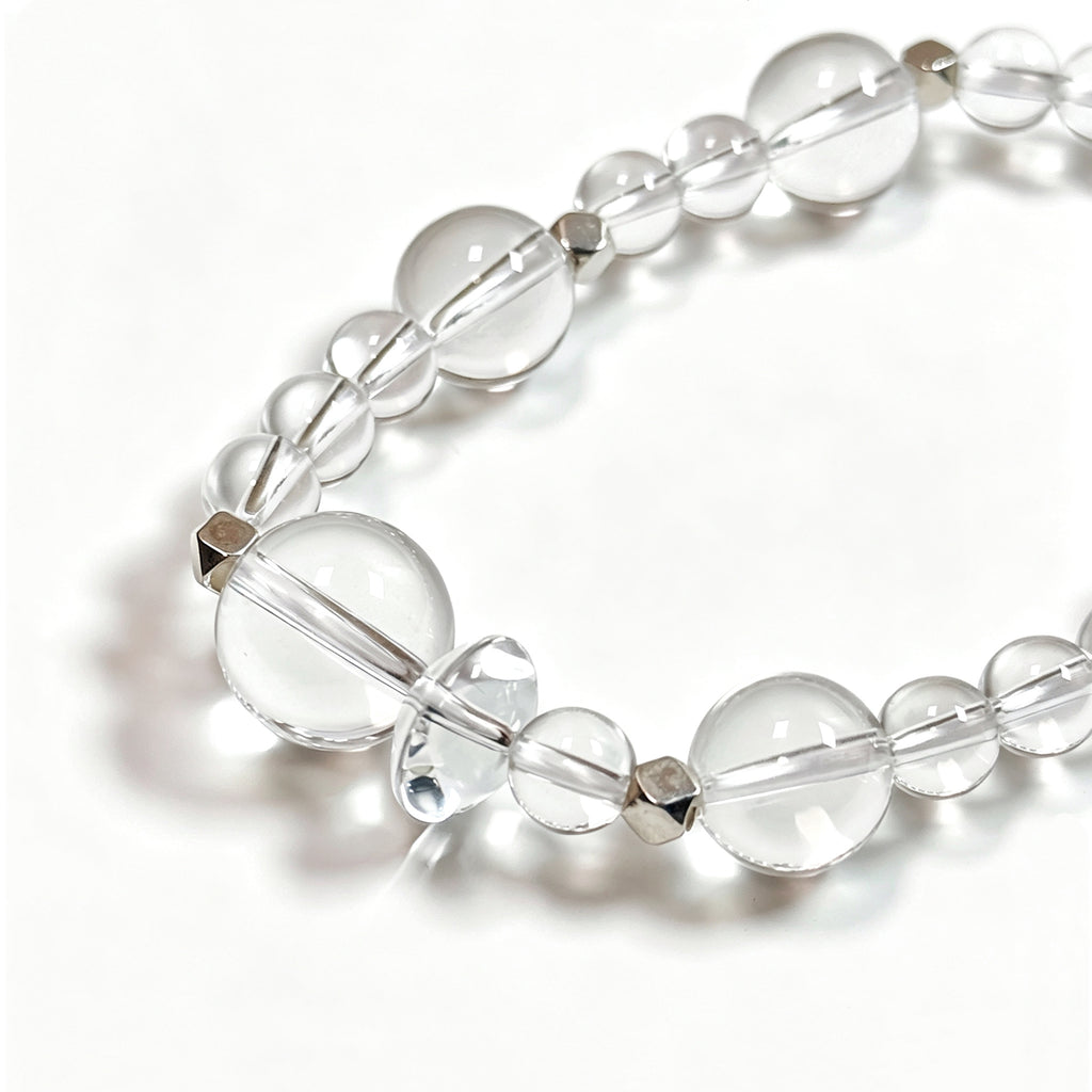 Close-up detail of Clear quartz crystal bracelet showing natural stone texture