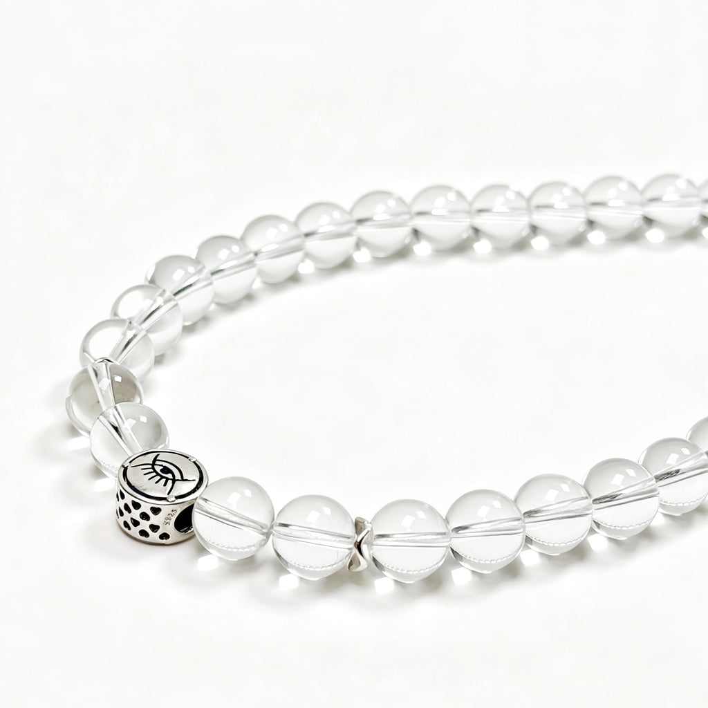 Close-up detail of Clear quartz crystal necklace showing natural stone texture for healing and balance