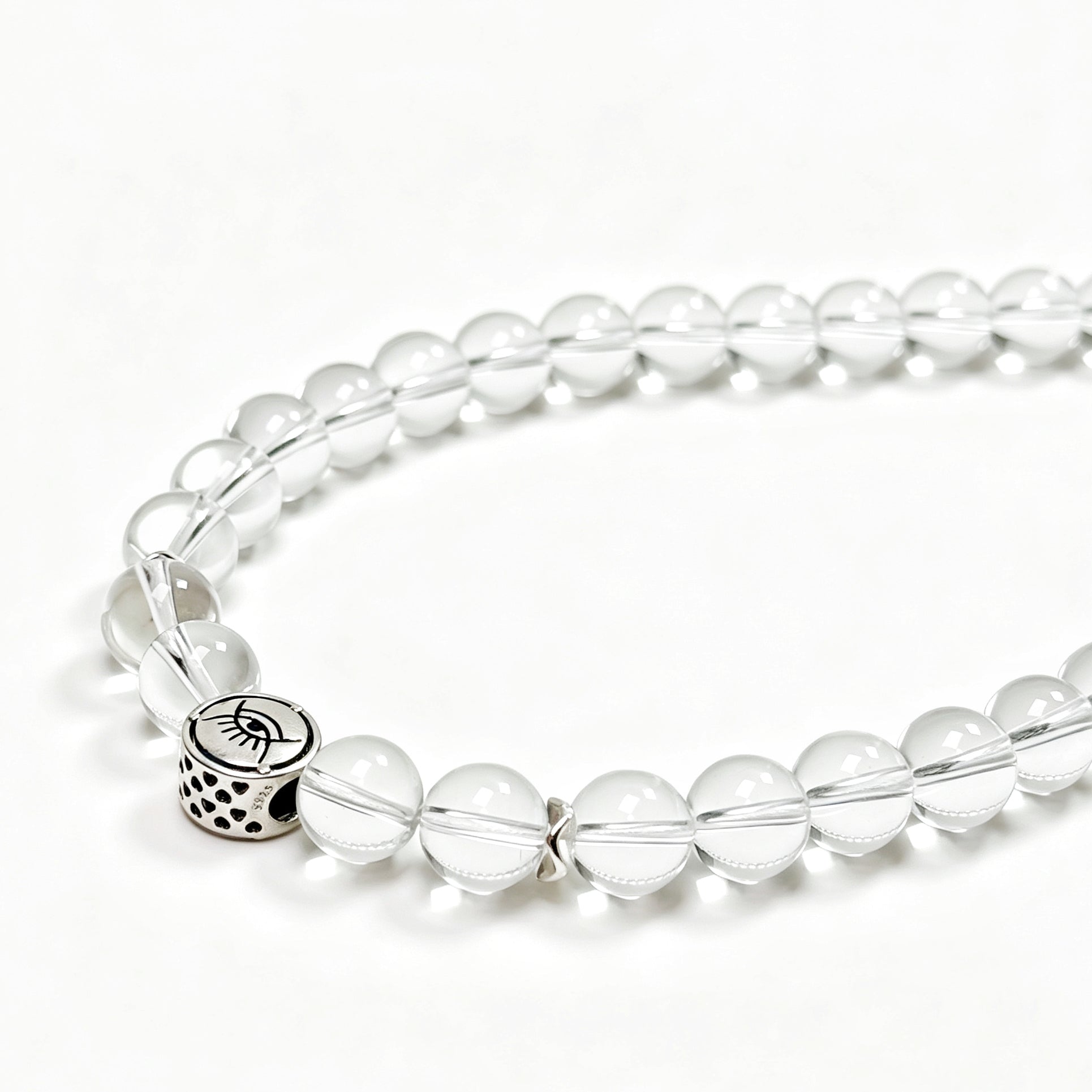 Close-up detail of Clear quartz crystal necklace showing natural stone texture for healing and balance