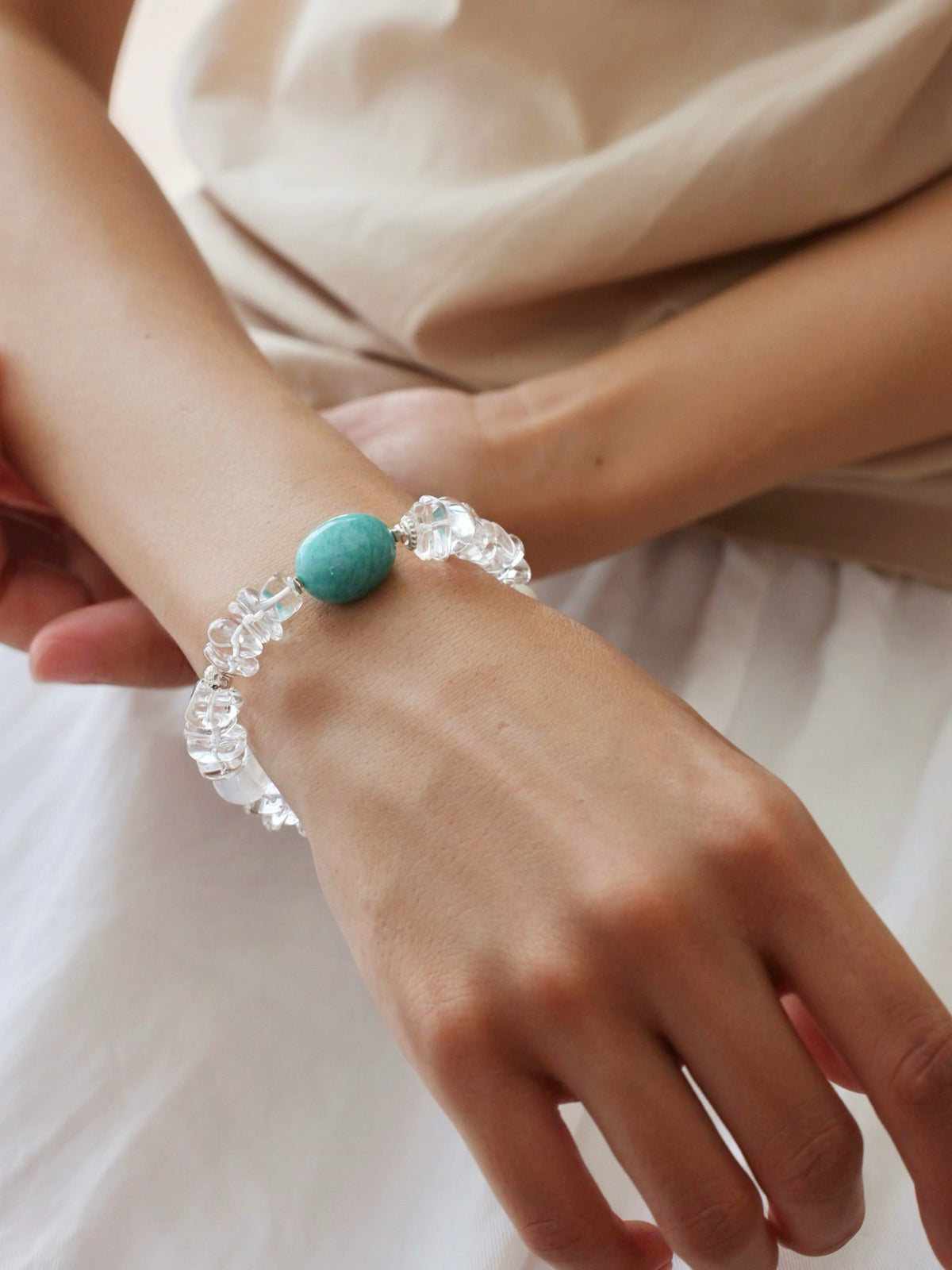 Collector-grade Clear Quartz, Amazonite and freshwater pearl bracelet worn on wrist