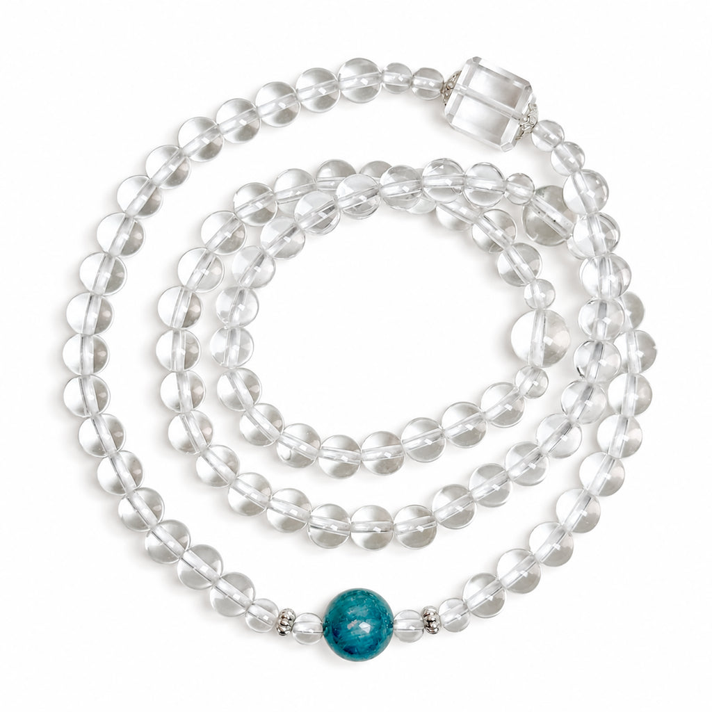 Collector-grade Clear Quartz and Monet Blue-Green Kyanite convertible necklace and triple-wrap bracelet with 925 sterling silver, photographed from above on a white background.
