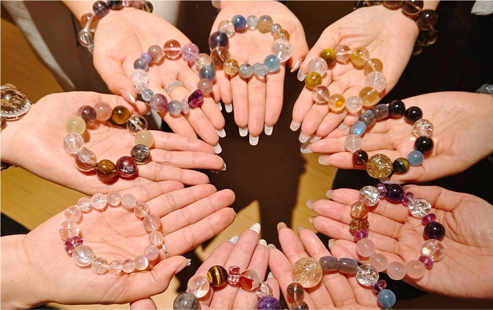 Happy customers showcasing their crystal bracelets and sharing positive energy and satisfaction