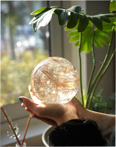 Natural collector grade crystal spheres with clarity and rainbow inclusions