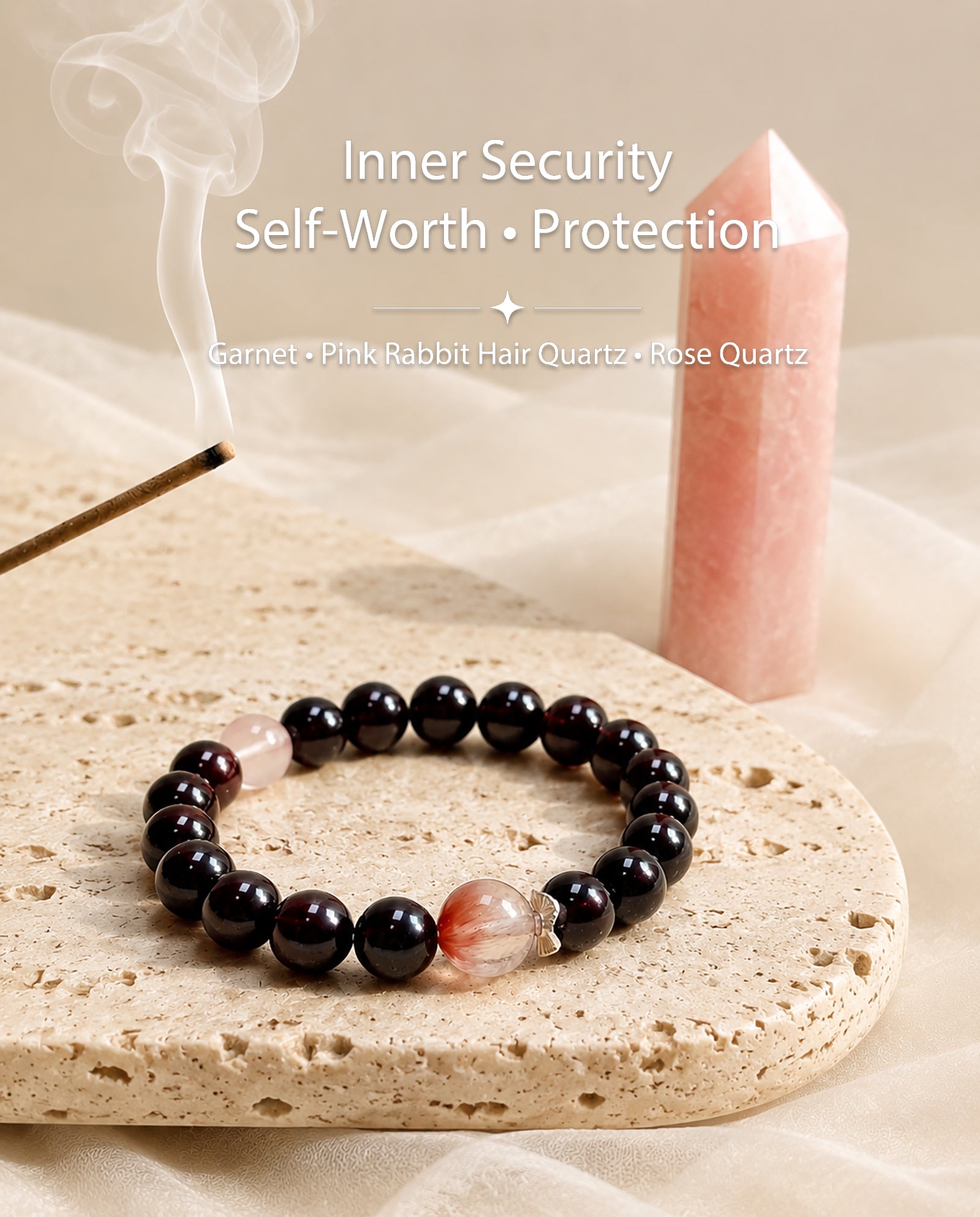 Garnet and pink rabbit hair quartz bracelet styled with natural crystals and soft ambient lighting