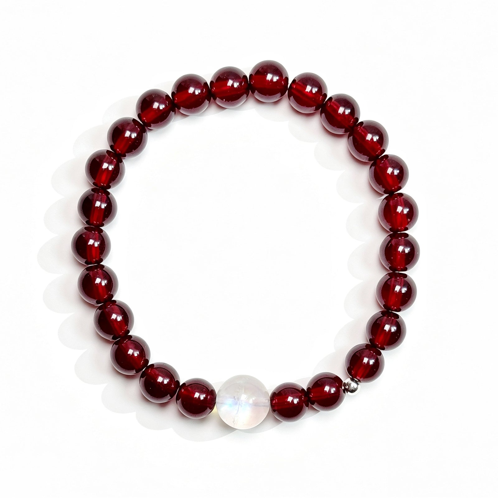 Top view of garnet and moonstone bracelet showing full bead arrangement