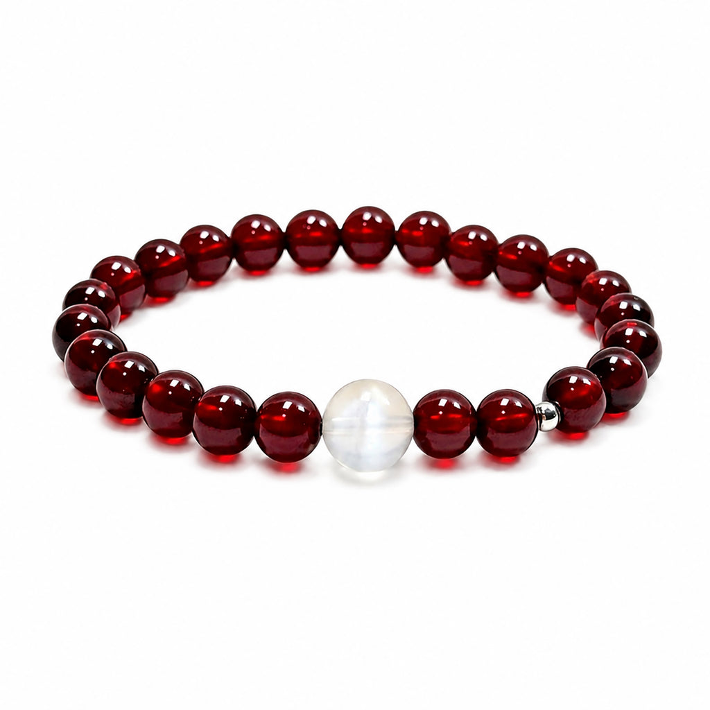 Garnet and moonstone bracelet on clean white background