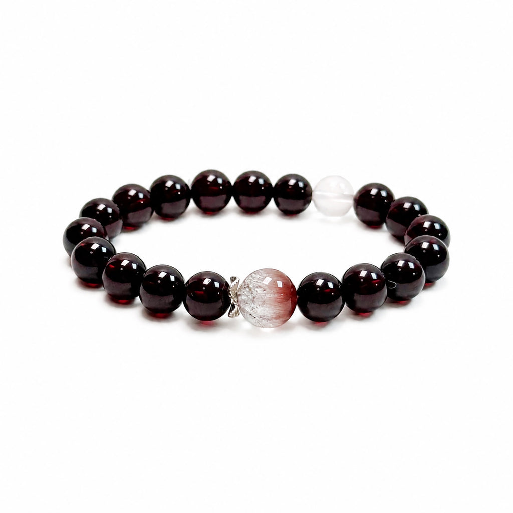 Garnet and pink rabbit hair quartz bracelet on clean white background