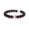 Garnet and pink rabbit hair quartz bracelet on clean white background