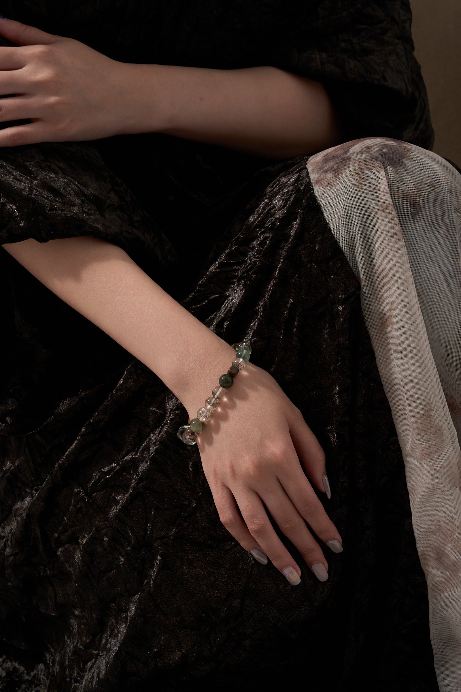 Green Phantom crystal bracelet worn on wrist showing the opposite side of the bracelet