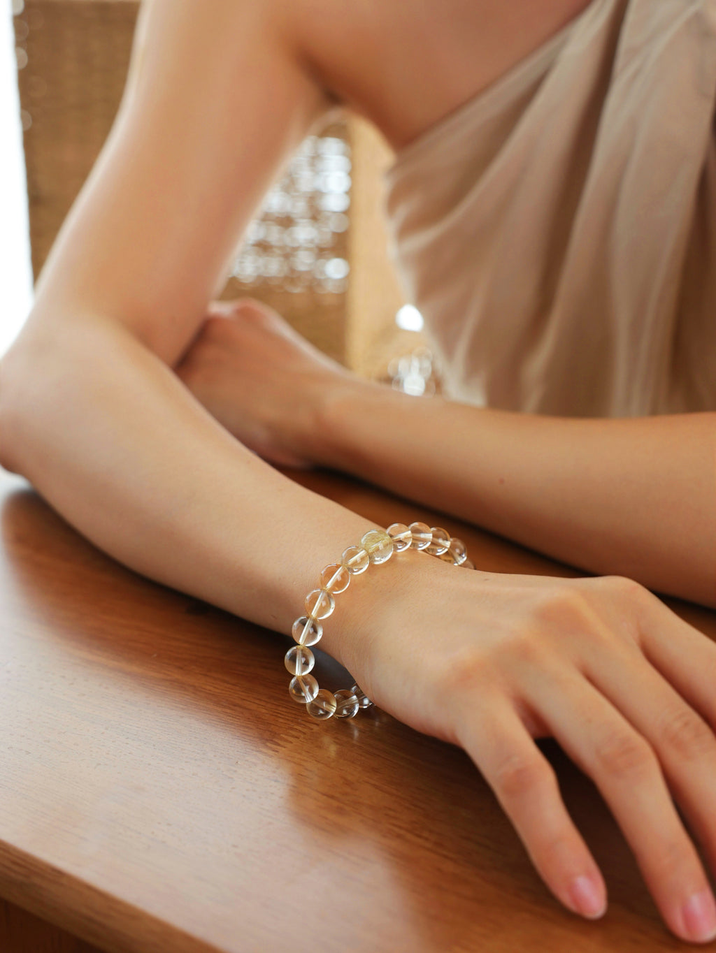 High-clarity Citrine and Golden Rutilated Quartz bracelet worn on wrist