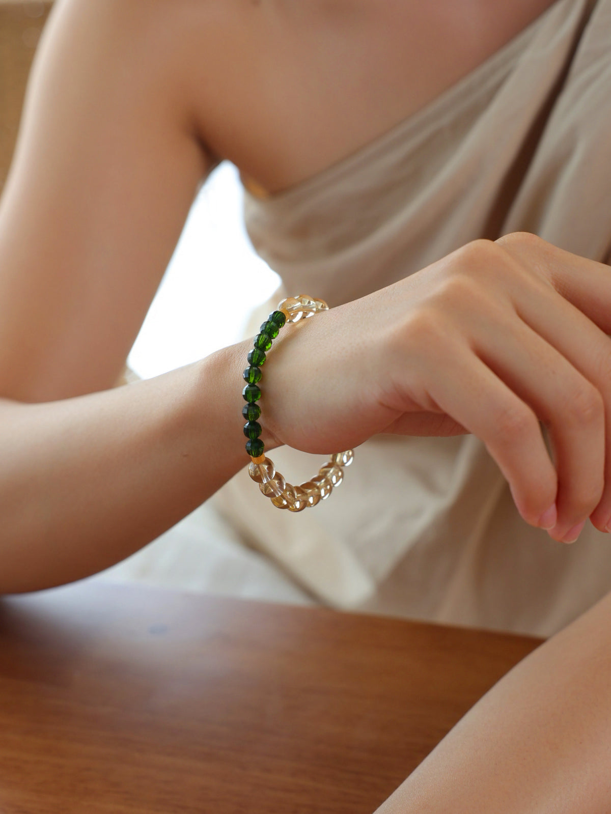 High-grade Citrine and emerald-green Diopside bracelet worn on wrist