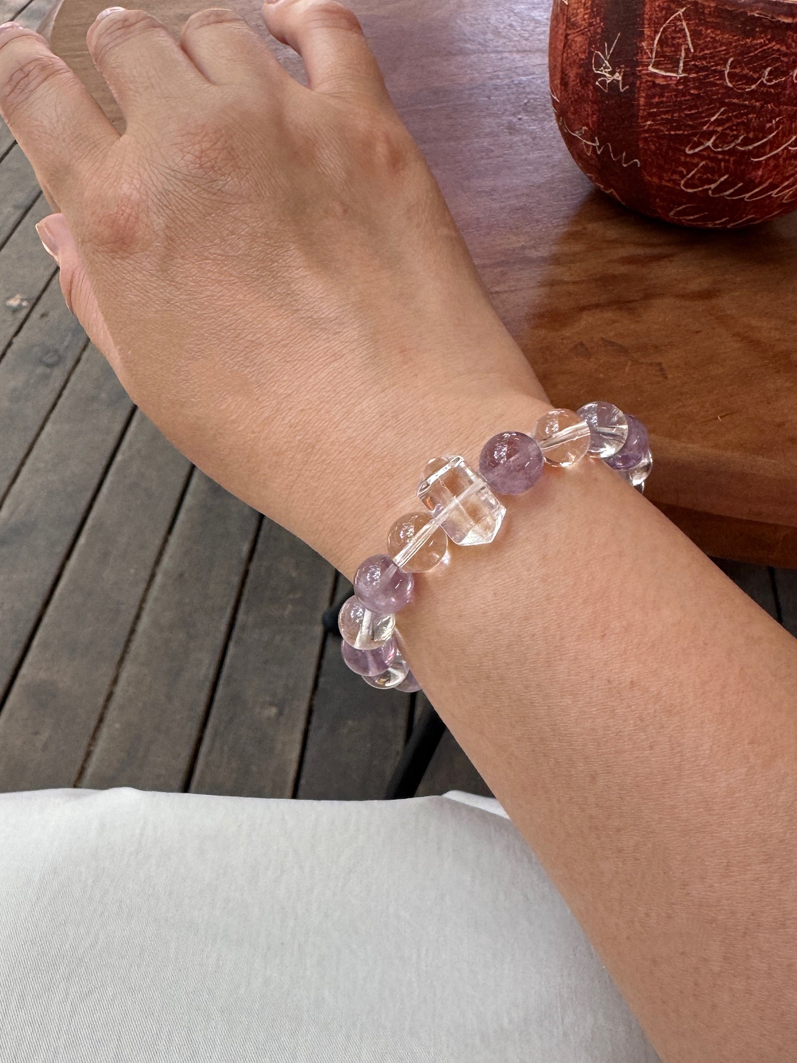 Himalayan clear quartz and amethyst bracelet worn on wrist close-up for intuition and quiet focus