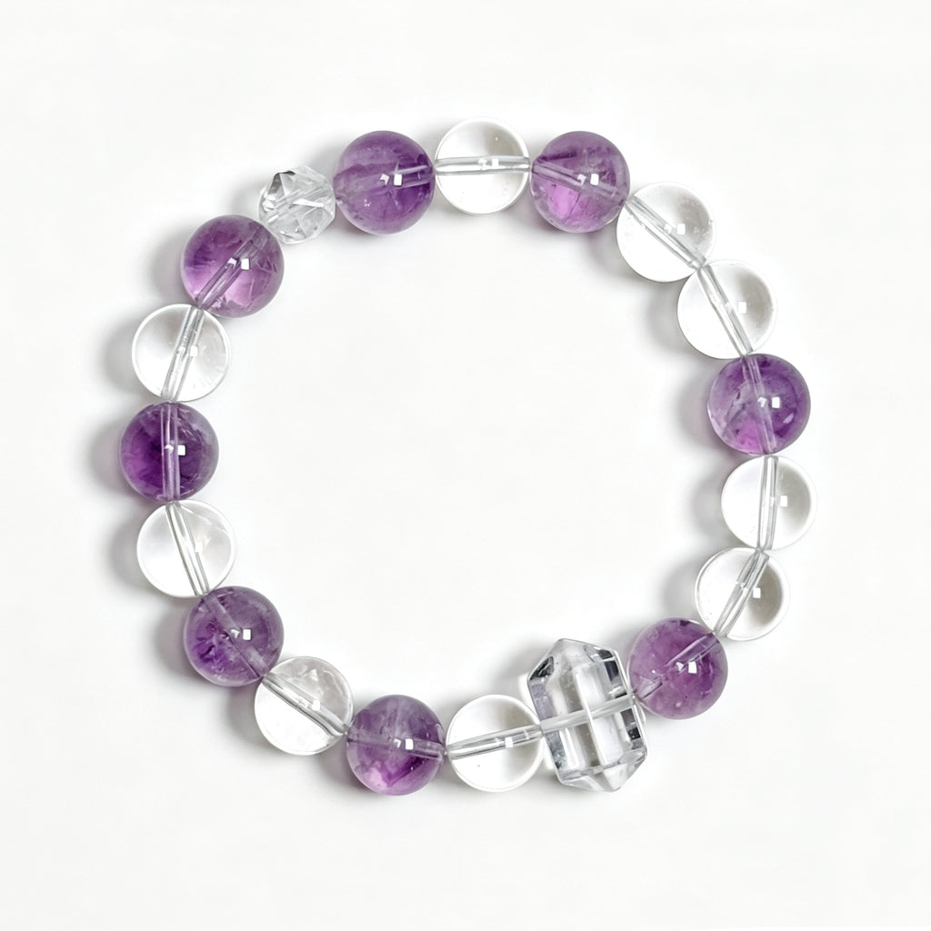 Top view of Himalayan clear quartz and amethyst bracelet showing full bead arrangement for intuition and calm focus