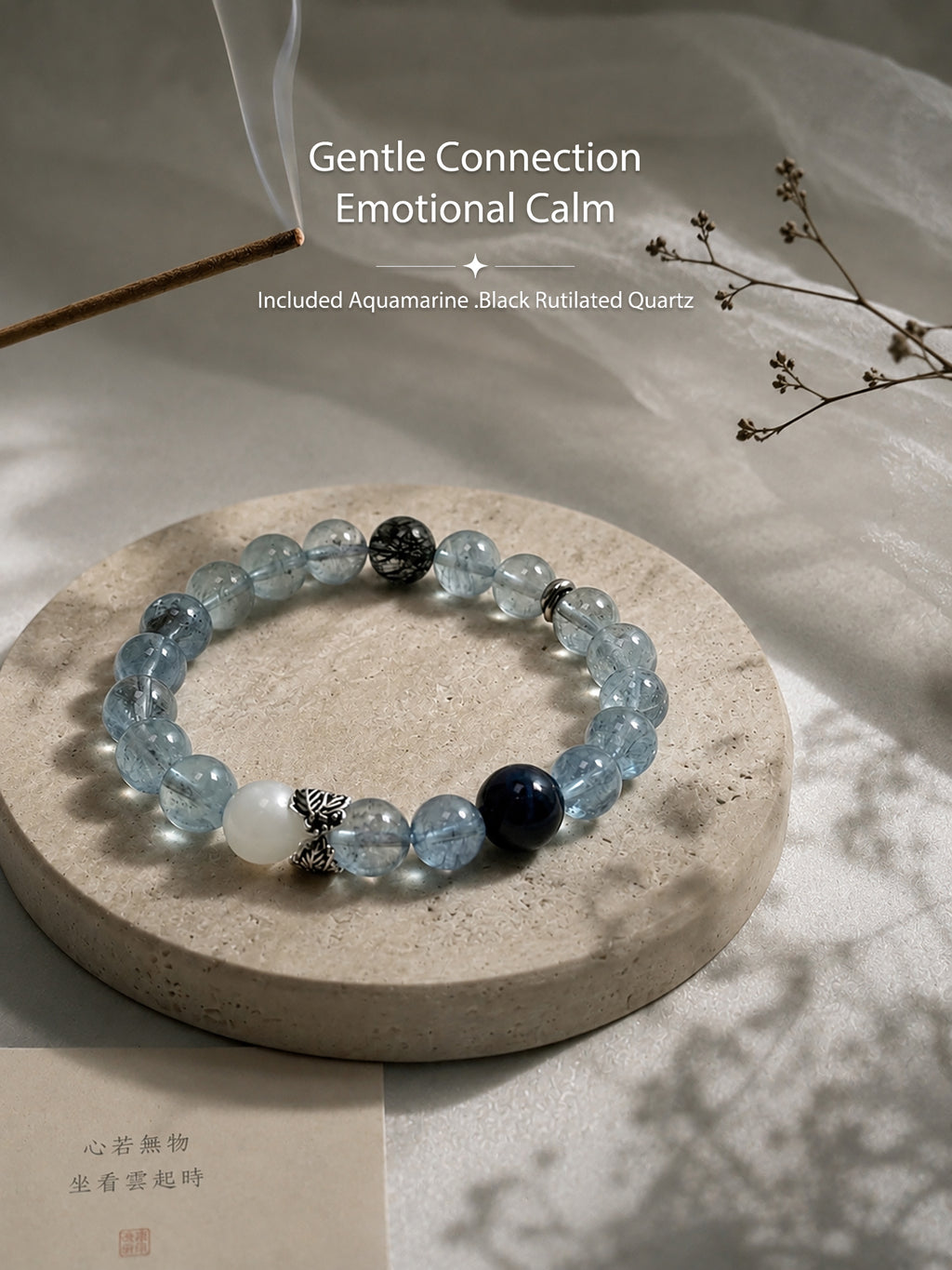 Included Aquamarine bracelet styled in a calm meditation-inspired setting with soft natural light