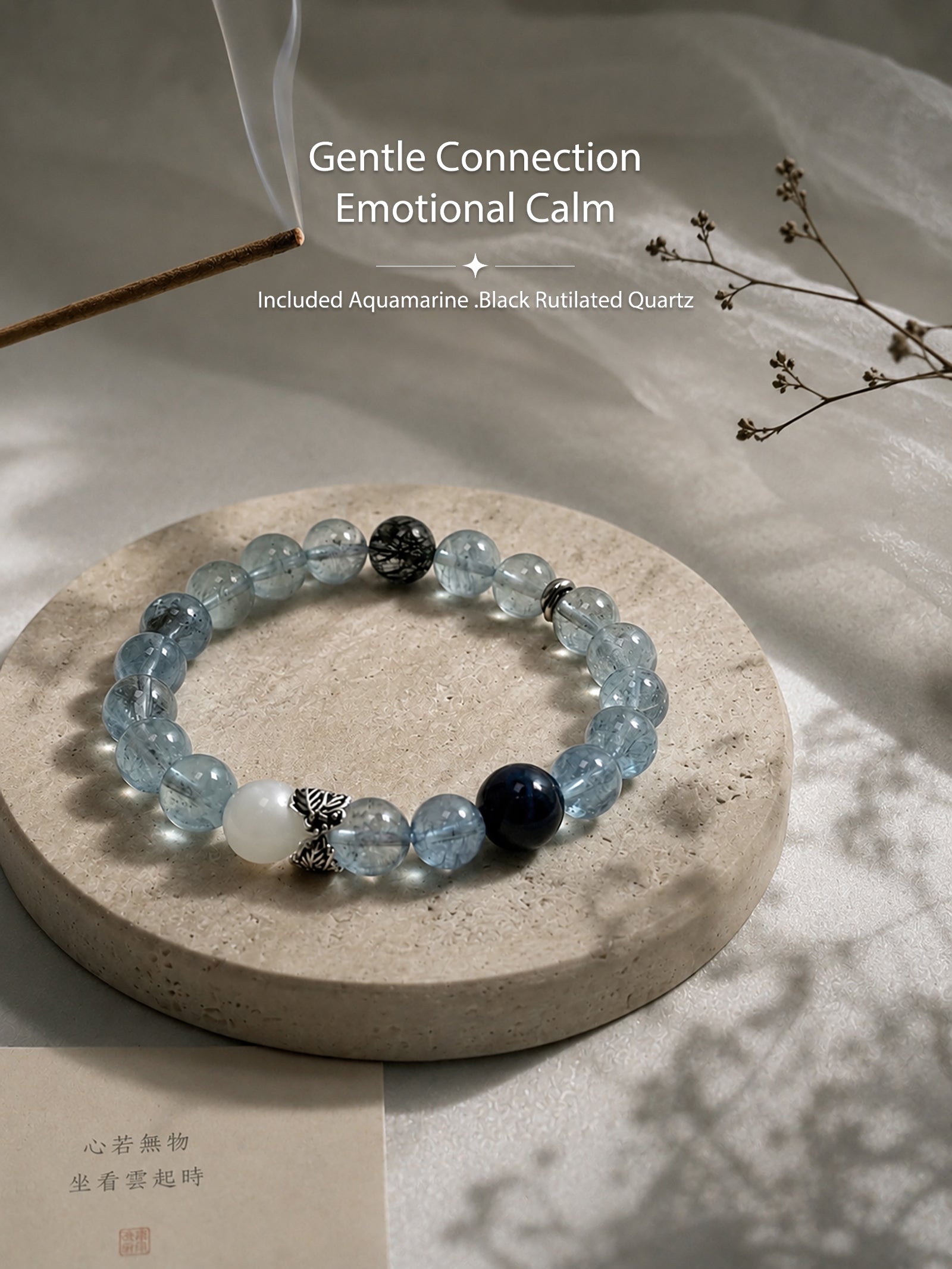 Included Aquamarine bracelet styled in a calm meditation-inspired setting with soft natural light
