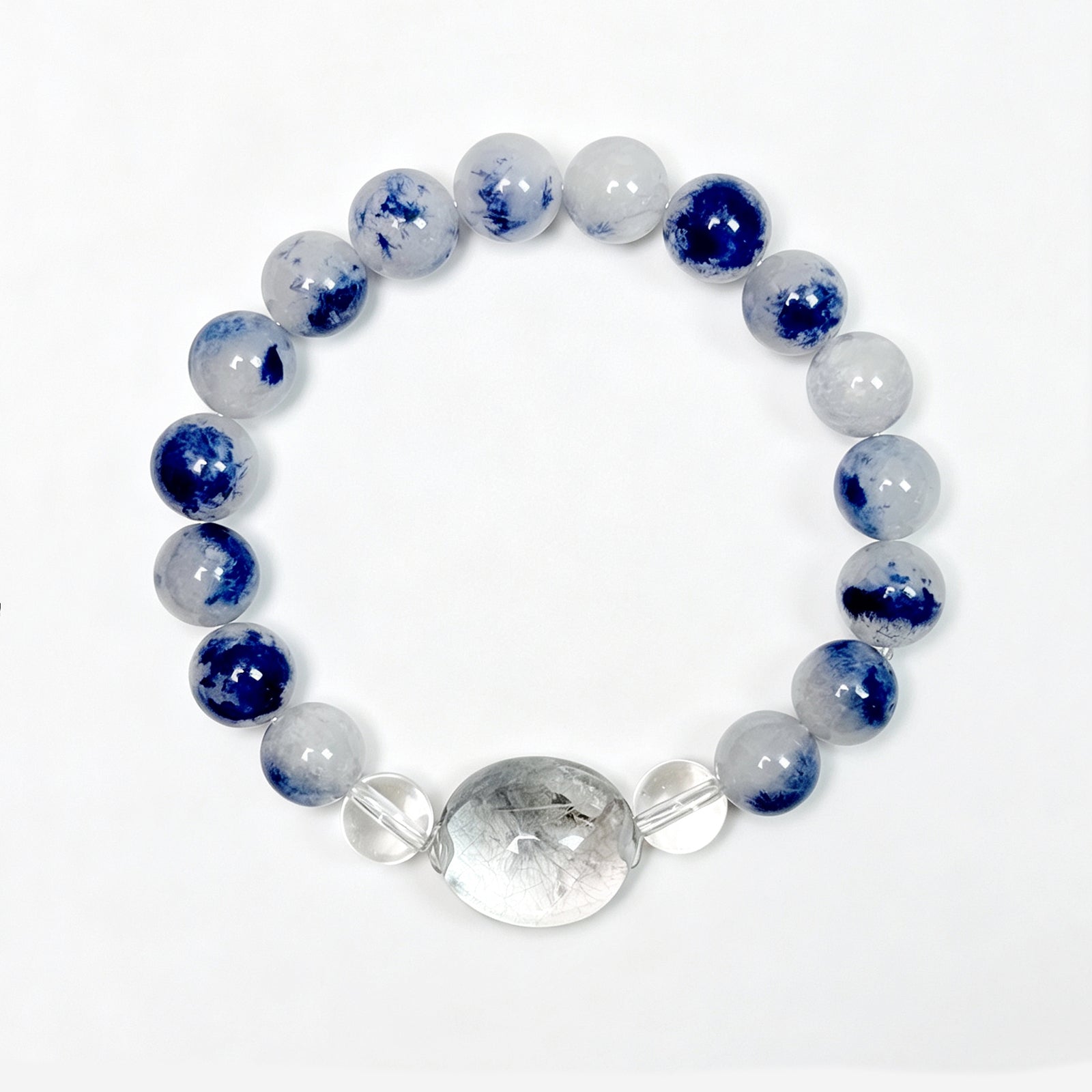 Top view of natural Kyanite and Blue Rutilated Quartz bracelet with 925 sterling silver accents