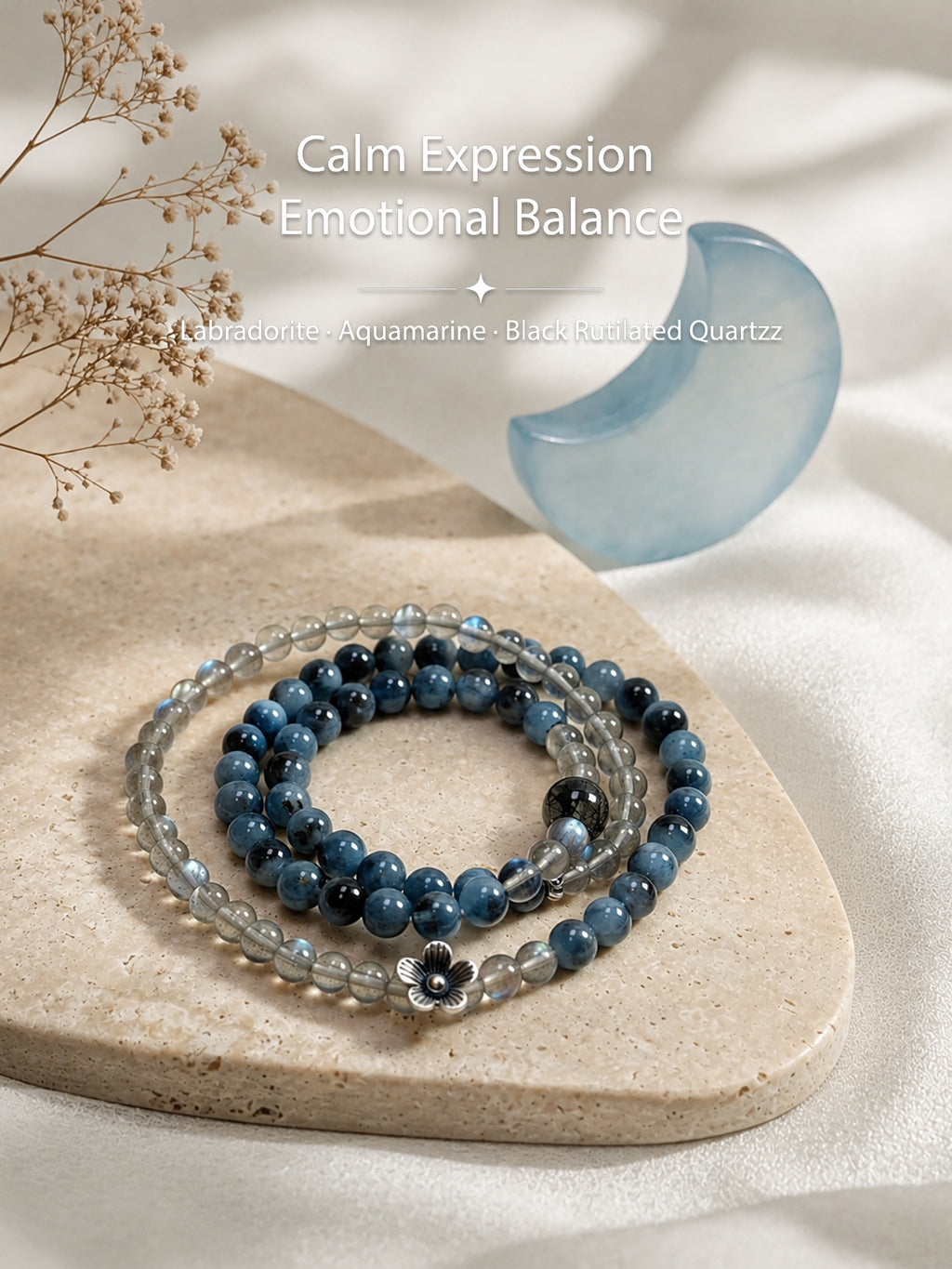 Labradorite and aquamarine wrap bracelet styled in a calm spiritual setting for emotional balance and peaceful expression