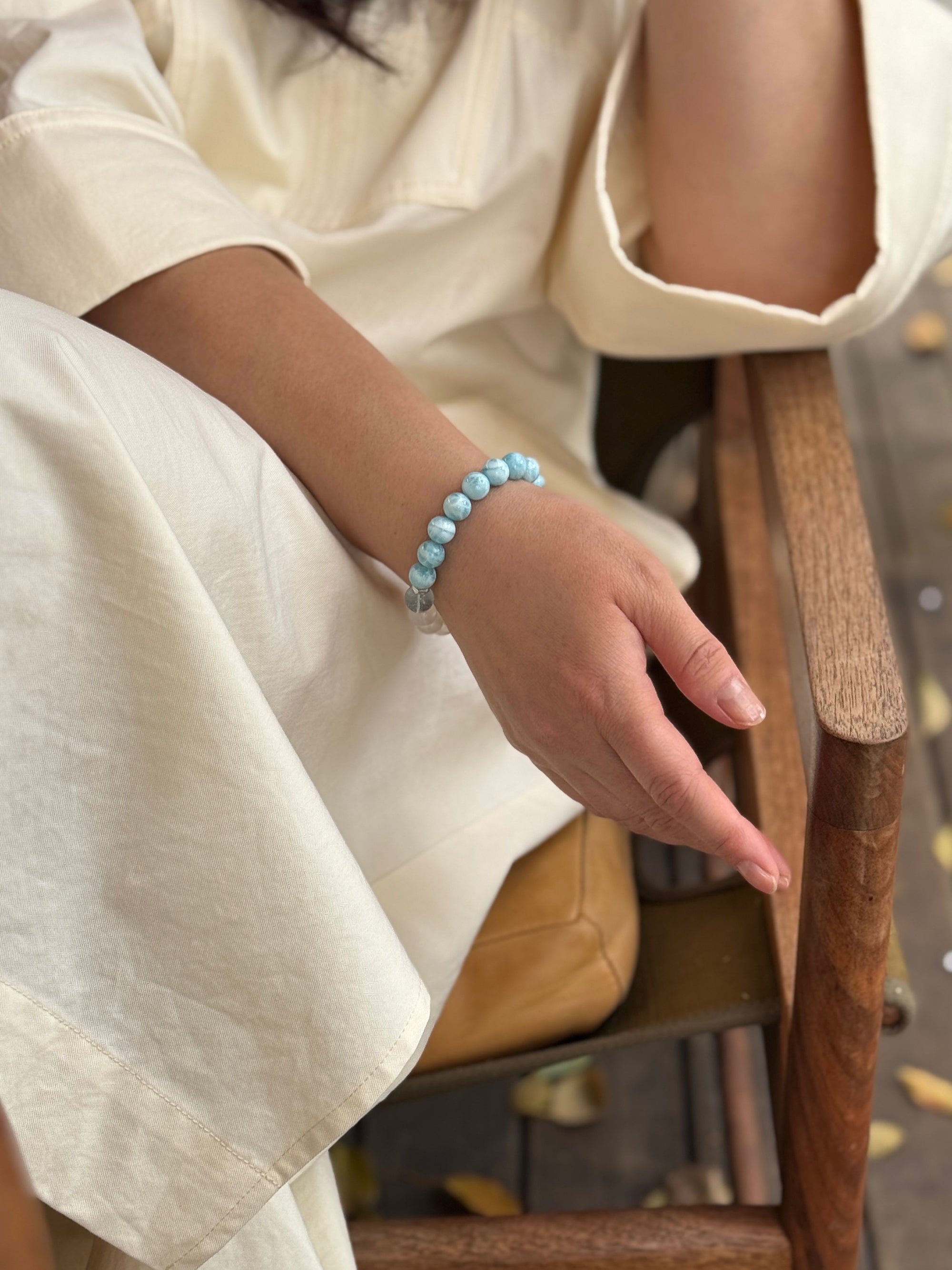 Larimar crystal bracelet worn on wrist close-up showing size and fit