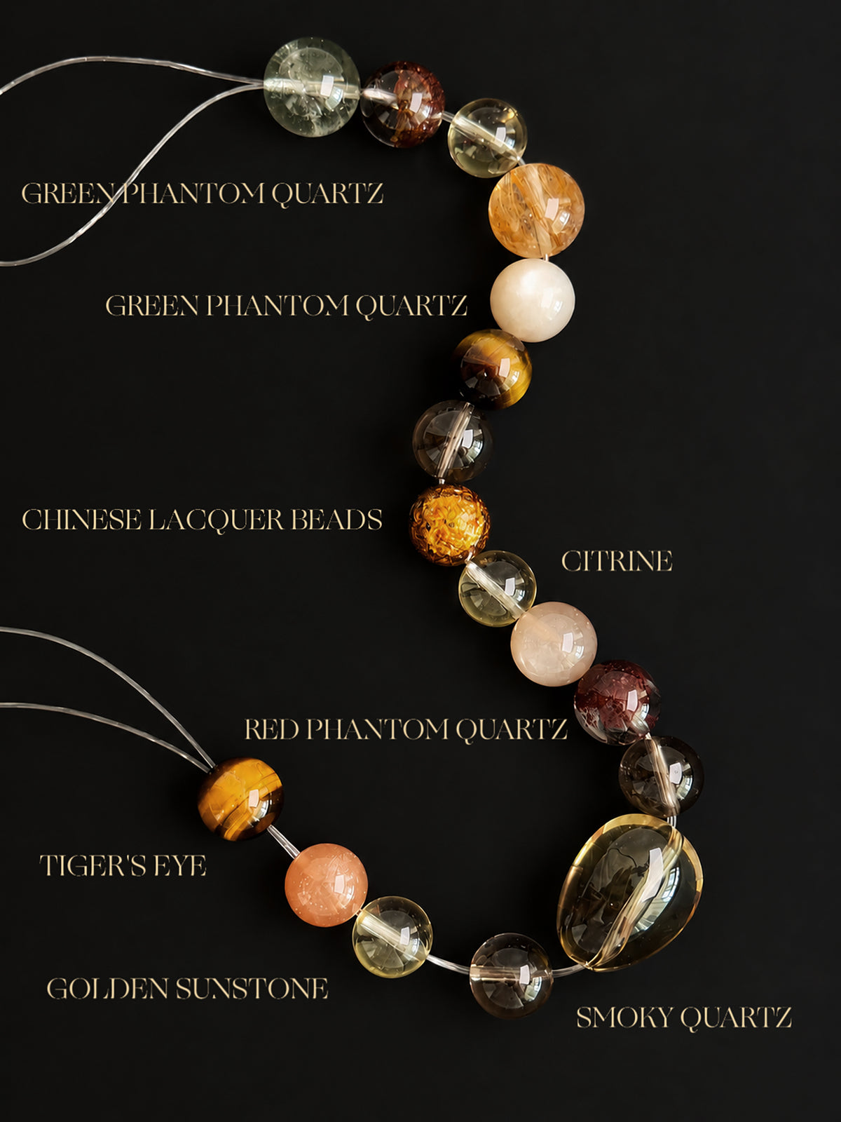 Natural Smoky Quartz, Phantom Quartz and Copper Rutilated Quartz Bracelet displayed on a dark background, highlighting the crystal inclusions, colors and mineral textures.