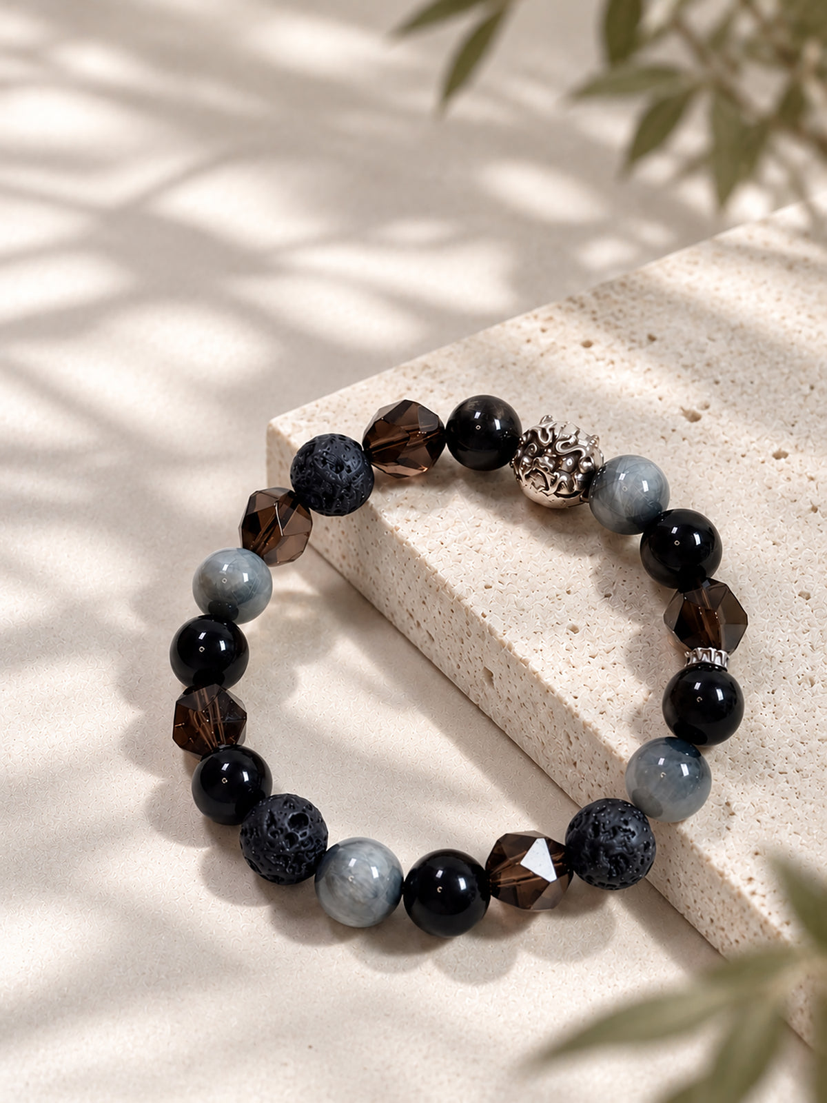 Protection and grounding crystal bracelet with Obsidian, Smoky Quartz, Hawk’s Eye and Lava Stone