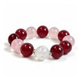 Side view of Pink Giant natural undyed Strawberry Quartz, Rose Quartz and Rainbow Clear Quartz bracelet with 925 sterling silver on a white background.