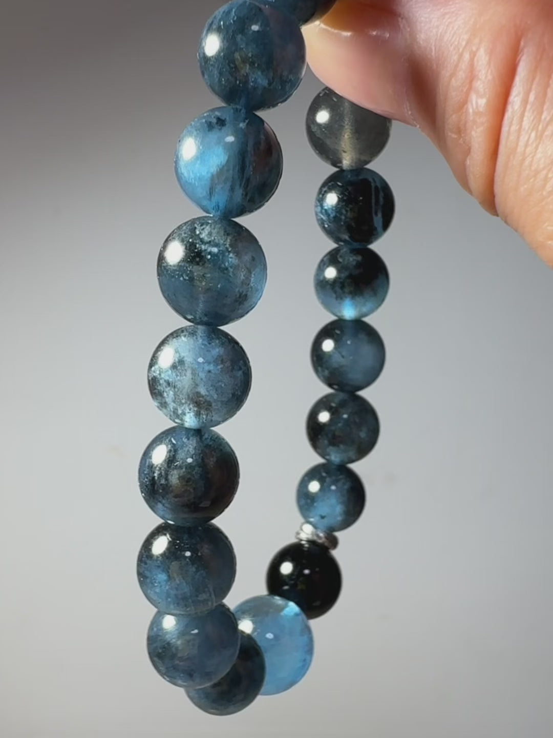 Video showcasing Aquamarine with Biotite bracelet details, natural textures, and overall design