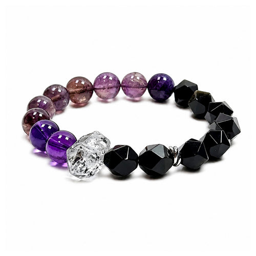 Purple titanium quartz, amethyst, and obsidian bracelet on clean white background for energetic protection and inner stabilit