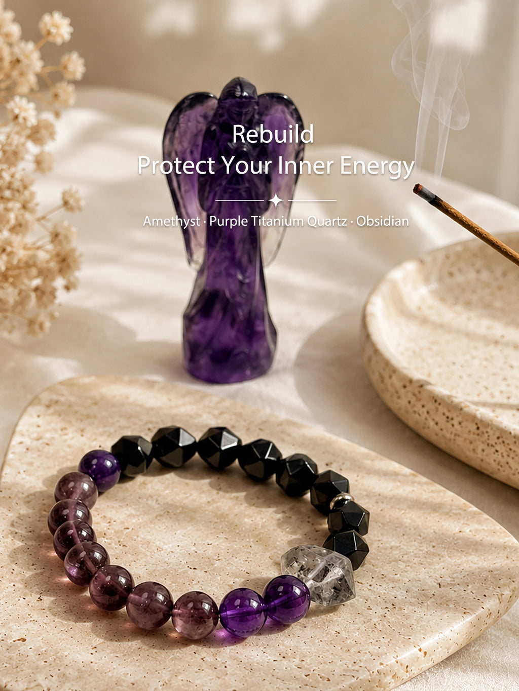 Purple titanium quartz, amethyst, and obsidian bracelet styled on meditation altar for energetic protection, grounded intuition, and inner stability